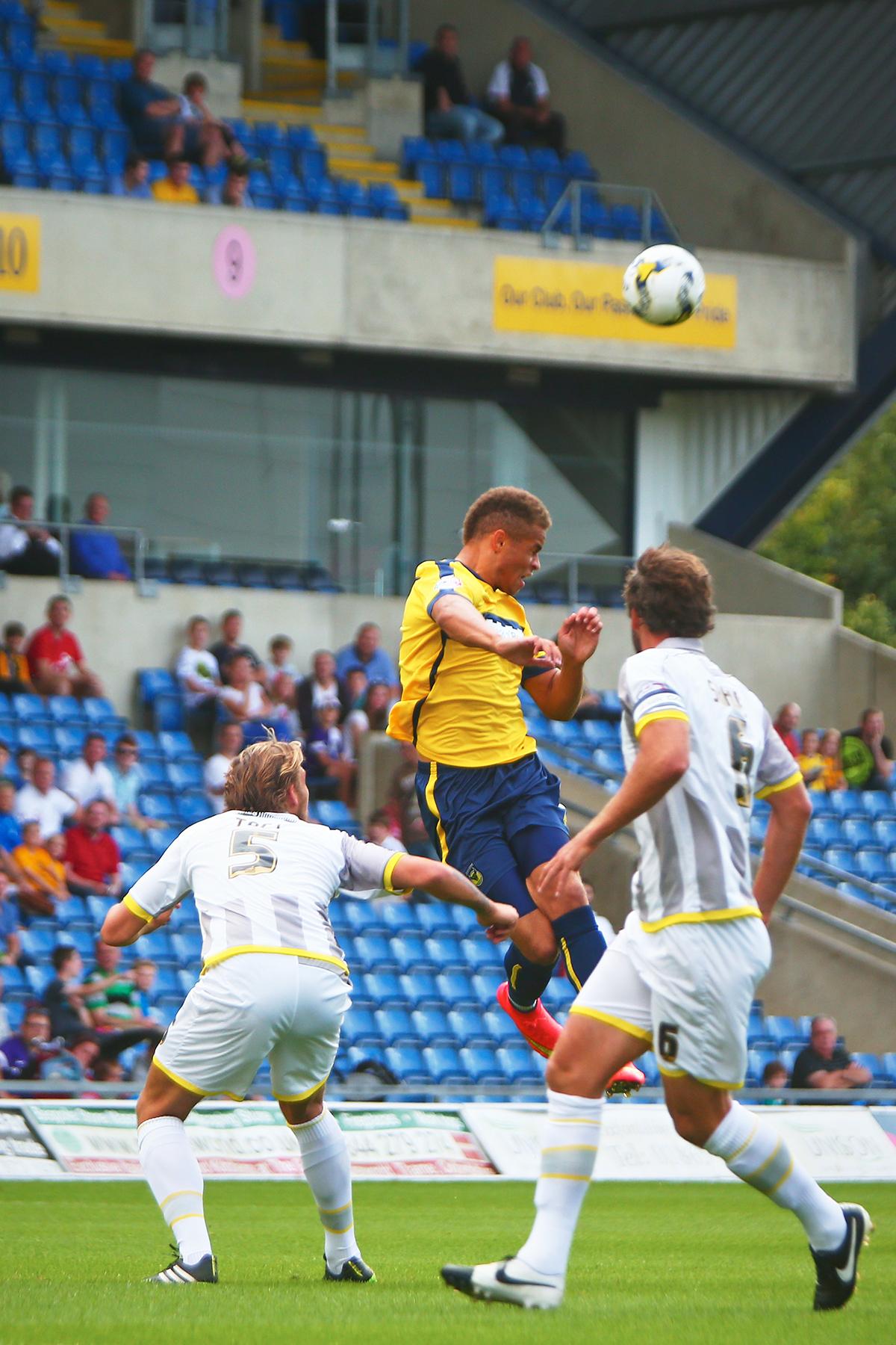 Pictures from United's 1-0 defeated at home to Burton Albion on the first day of the 2014 football season.