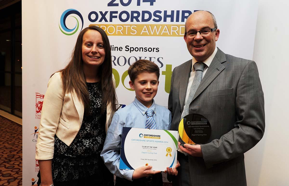 Pictured are Tony Gray and his 10-year-old son George who were collecting the Club of the Year Award on behalf of Zappi's Cycle 