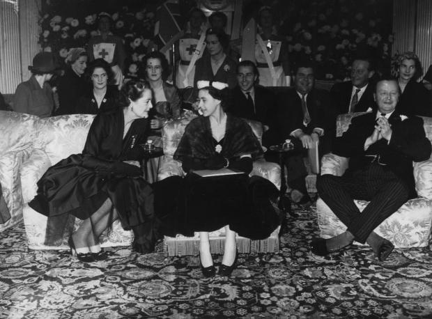 Front-row seat: Princess Margaret with the Duke and Duchess of Marlborough at the Christian Dior fashion show held at Blenheim