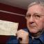Syd Kearney with his prized Beatles' autographs
