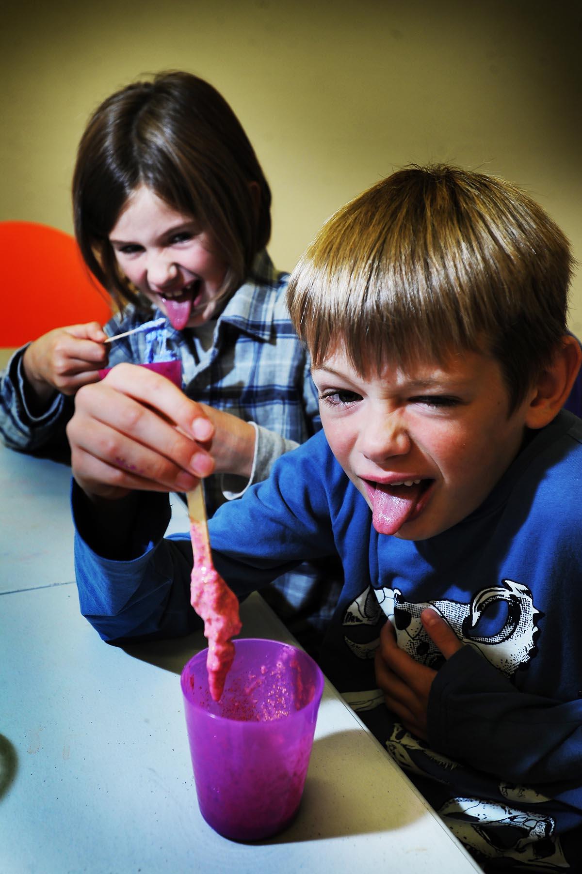 Maisie and Alfie Moore, aged eight and seven, enjoy a slime-making class at the Story Museum