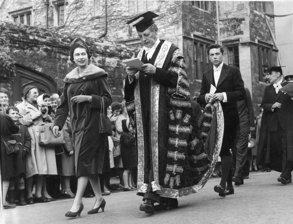 The Queen and Harold Macmillian, then-Prime Minister and the Chancellor of Oxford University, walking in Broad Steet on November 4, 1960.
