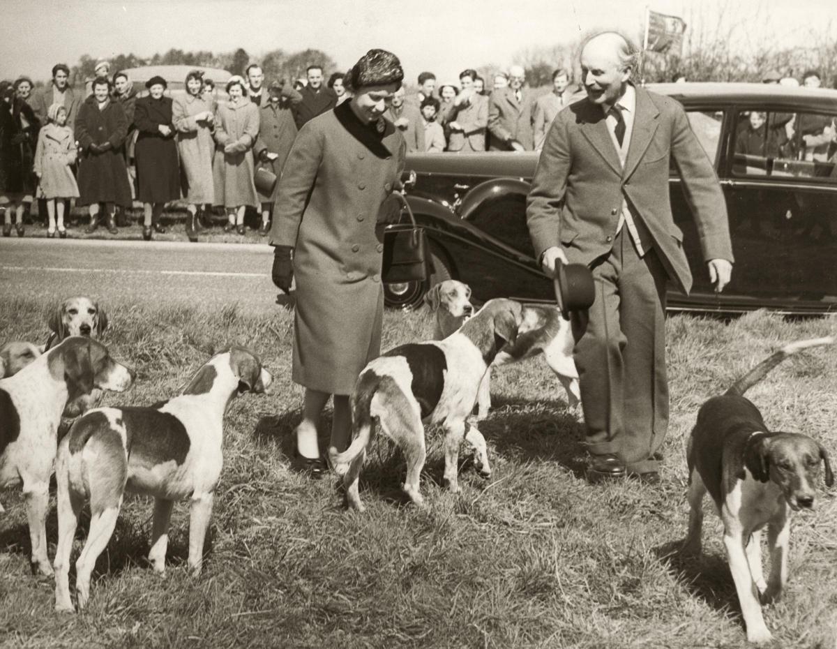 The Queen makes an unscheduled stop to meet the Heythrop Hounds in April 1959. She is pictured with Major Philip Fleming.