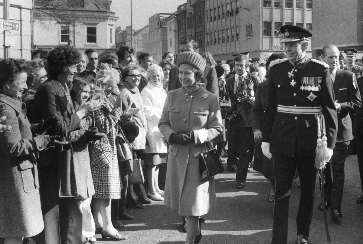 The Queen, accompanied by the Lord Lieutenant of Oxford, Colonel Sir John Thomson, arrives at Westgate Centre in Oxford on March 5 1976.