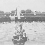 Ann, Peter and Susan Taylor, with their father Philip at Tumbling Bay in about 1958