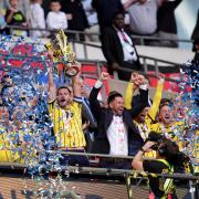 Oxford United lift the trophy at Wembley Stadium