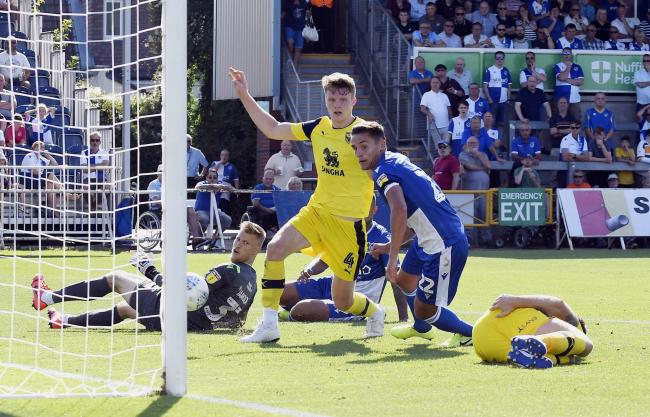 Oxford United defender Rob Dickie sees the ball cleared off the line against Bristol Rovers Picture: David Fleming