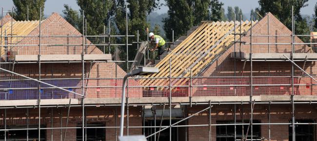 File photo of construction work on new homes. Photo: Peter Byrne/PA Wire.