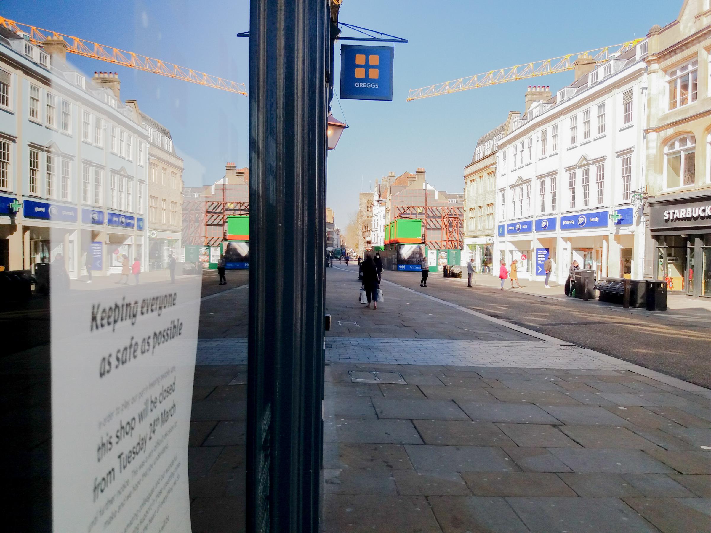 Shops in Cornmarket Street, Oxford, closed for lockdown. Picture: Pete Hughes