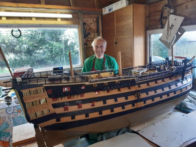  Michael Byard and his model replica of HMS Victory. Picture: Anni Byard.(Left Picture) HMS Victory in Portsmouth Historic Dockyard.