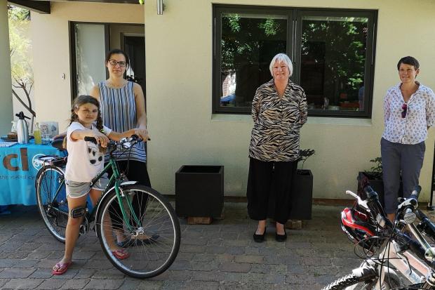 '200th Keyworker receives bike' - pictured from right to left: JR Neurology ITU keyworker Agnes and niece Emily, bike donor Judy, and volunteer mechanic Sara