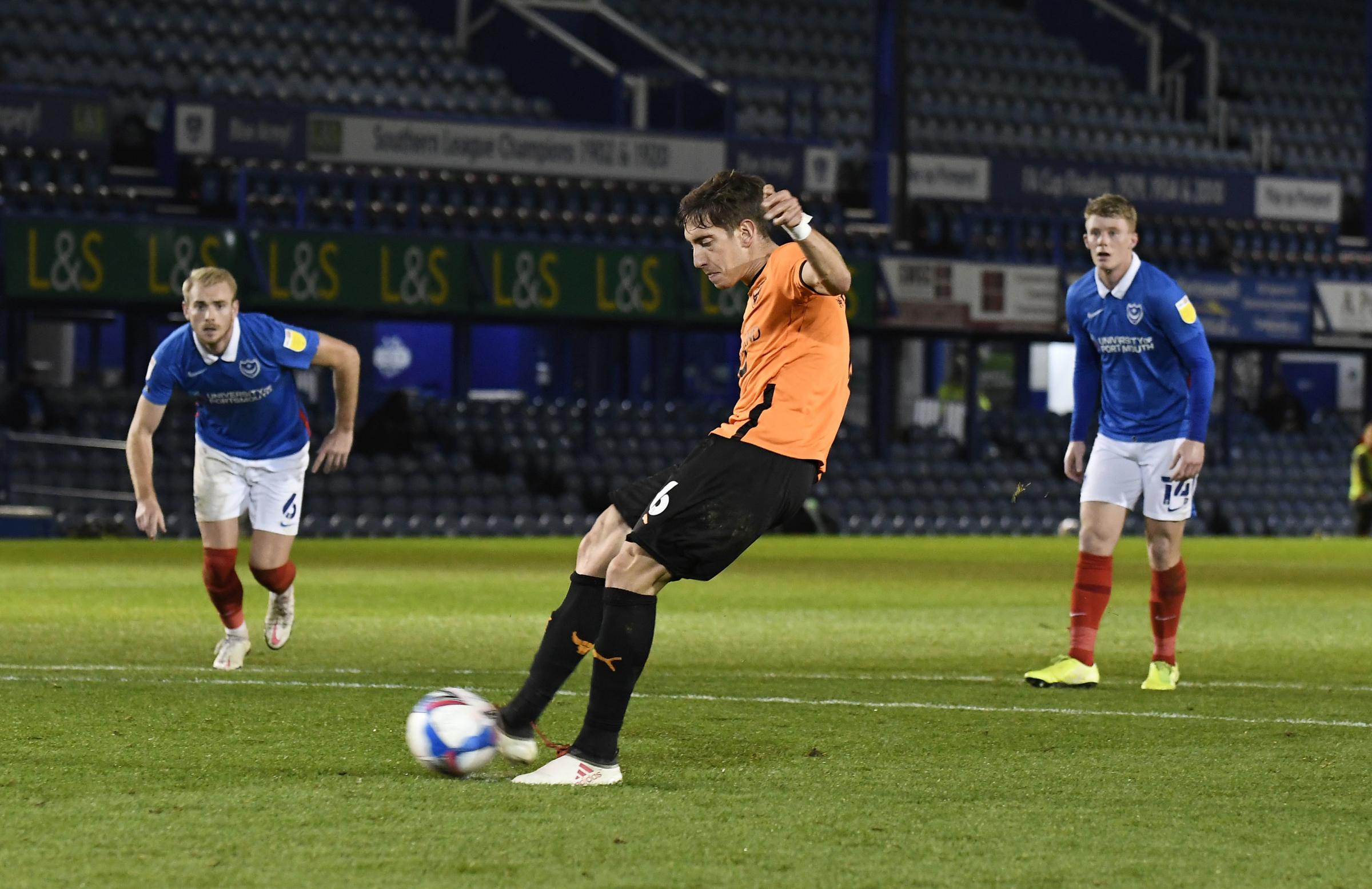 Alex Gorrin scores from the penalty spot against Portsmouth Picture: David Fleming