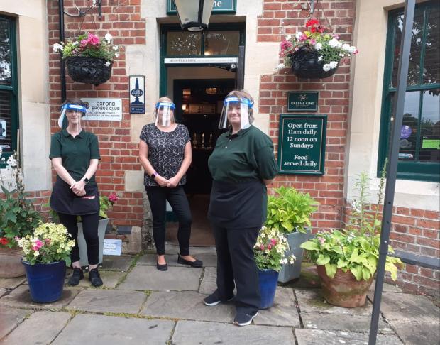Staff outside The Plough in Wolvercote 