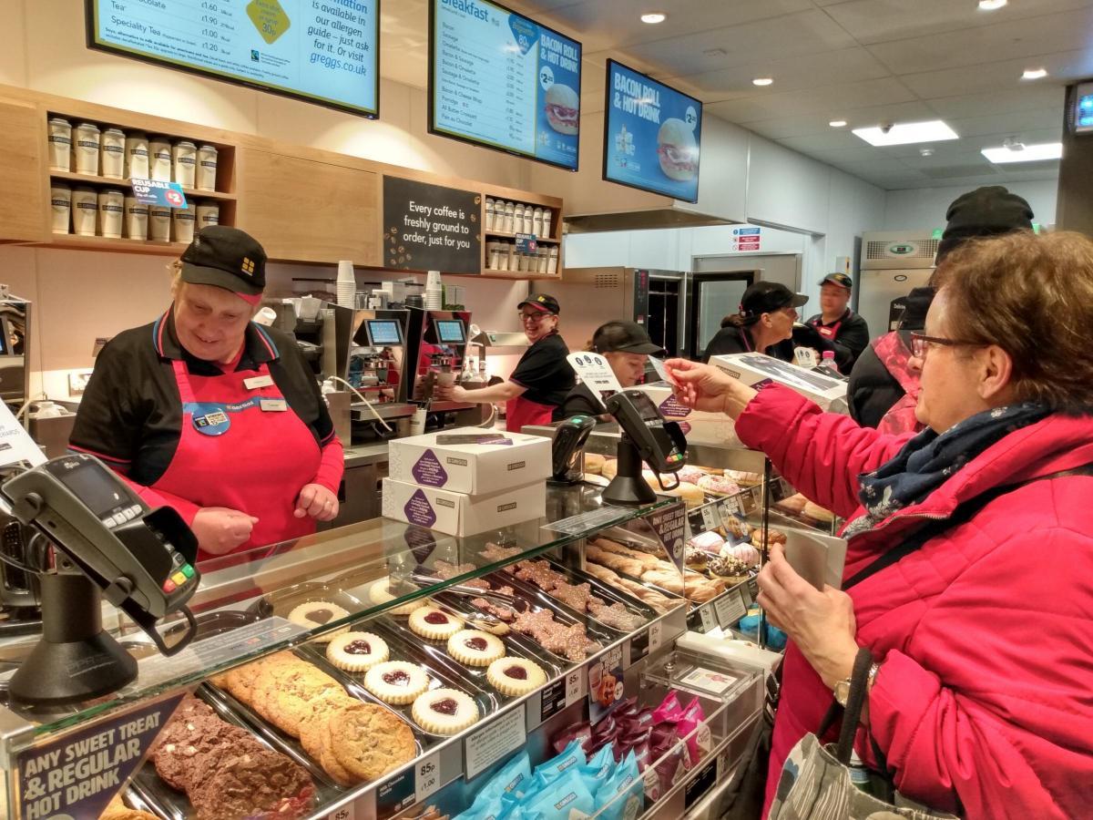 Staff serve Greggs on the opening day in 2020 Picture: Andy Ffrench