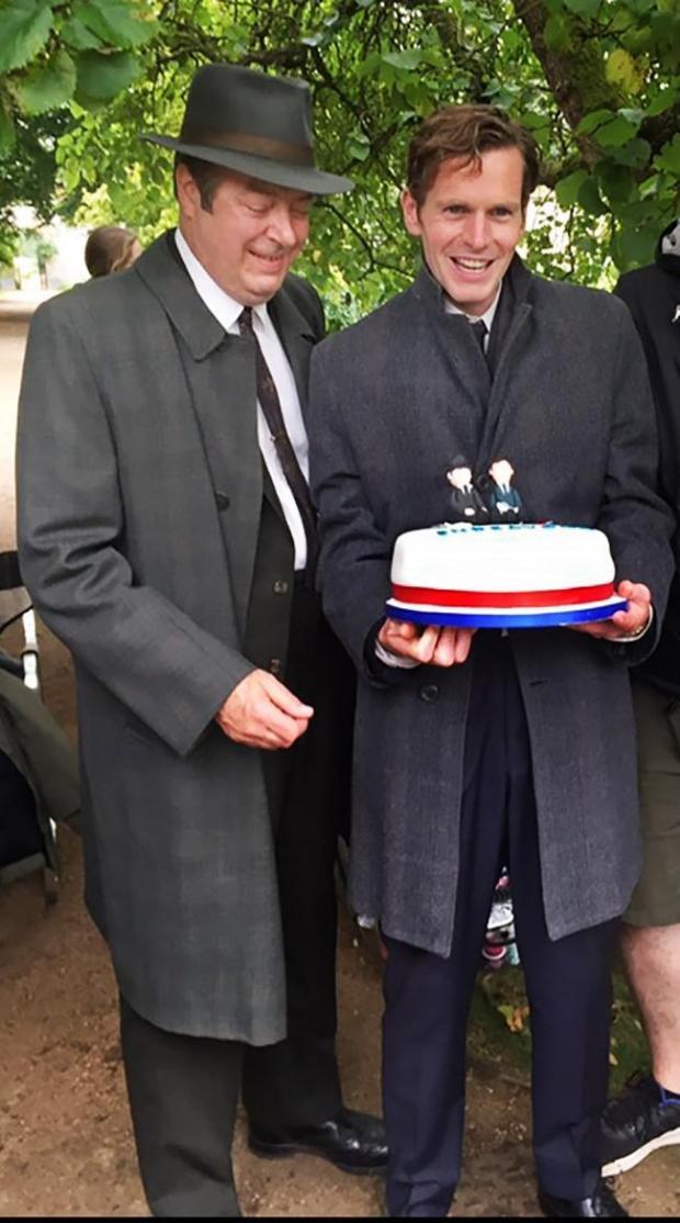 Oxford Mail: Shaun Evans and Roger Allam with a cake baked by Julia Atkinson from Happy Cakes 