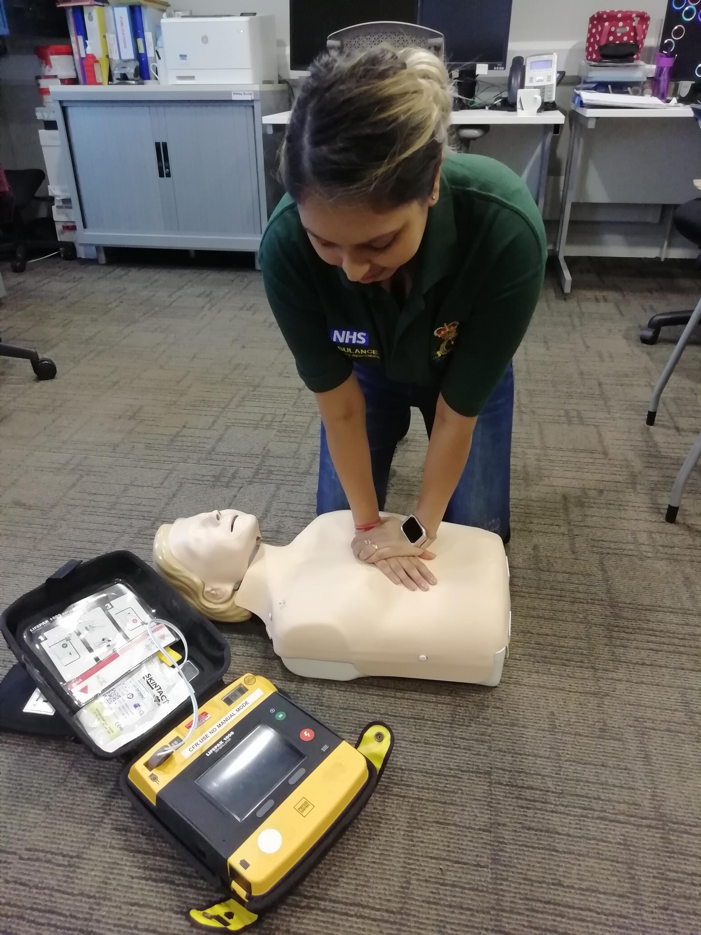 Nikhyta Patel from SCAS demonstrating first aid.