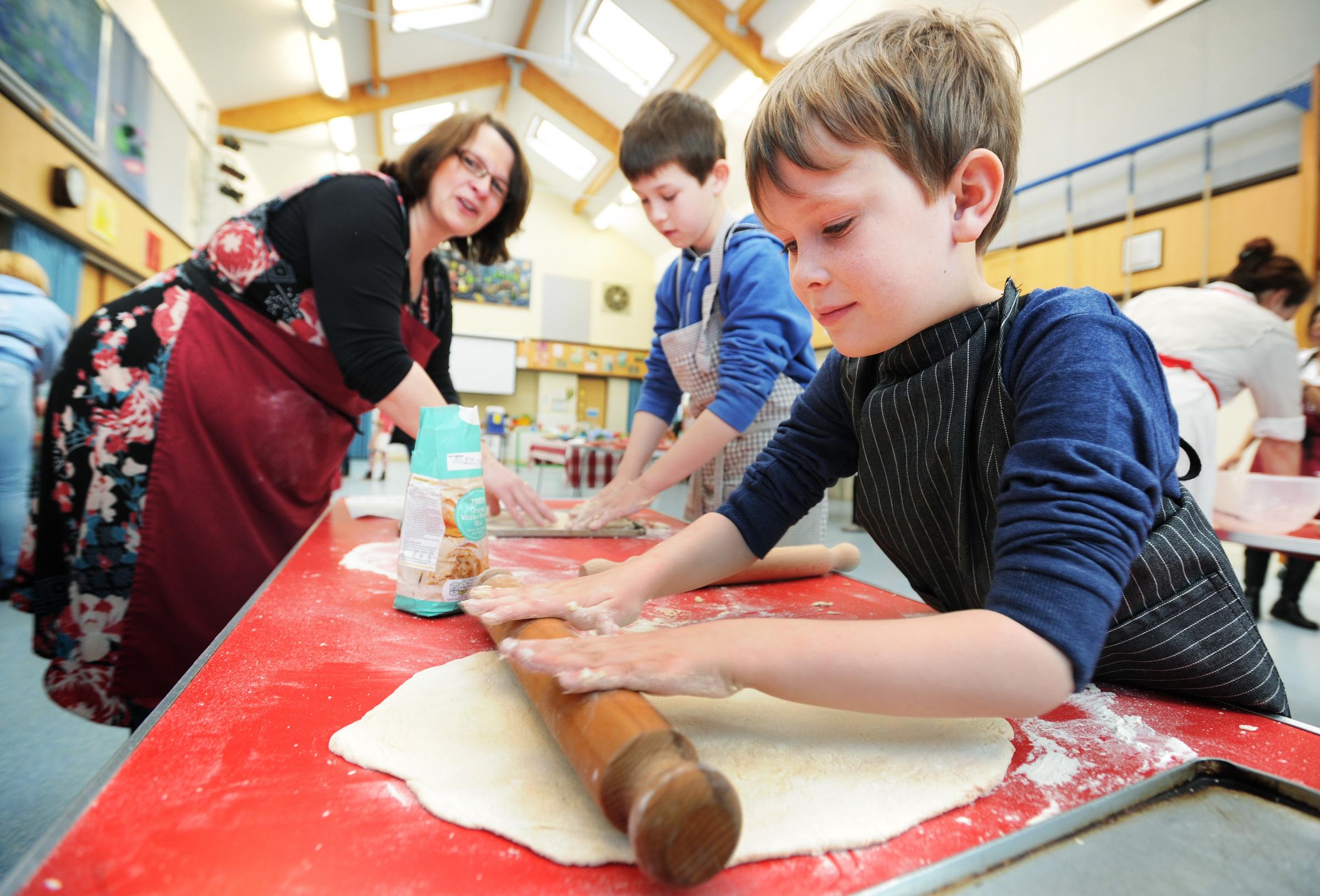 PIC BY JON LEWIS. 03.03.14. Hook Norton Catchline: cookathon Priority: Pic For: Rachel Bayne Children at Hook Norton C of E Primary School were taking part in the national Lets Get Cooking Big Cookathon 2014. Call the schools business manager and