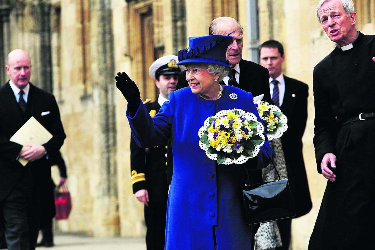 The Queen waves in the quad at Christ Church in 2013 