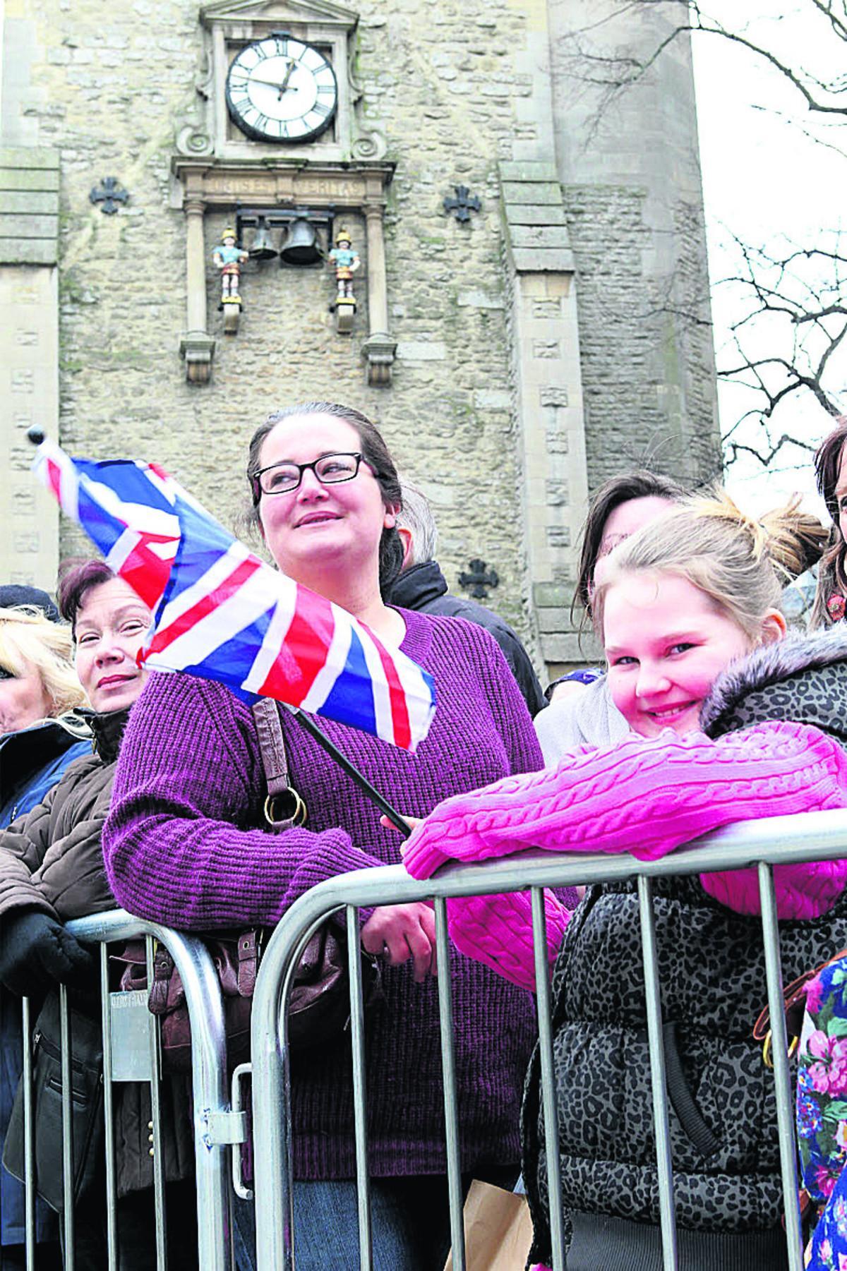 Sophie Cross, nine and mum Becky wait for the Queen