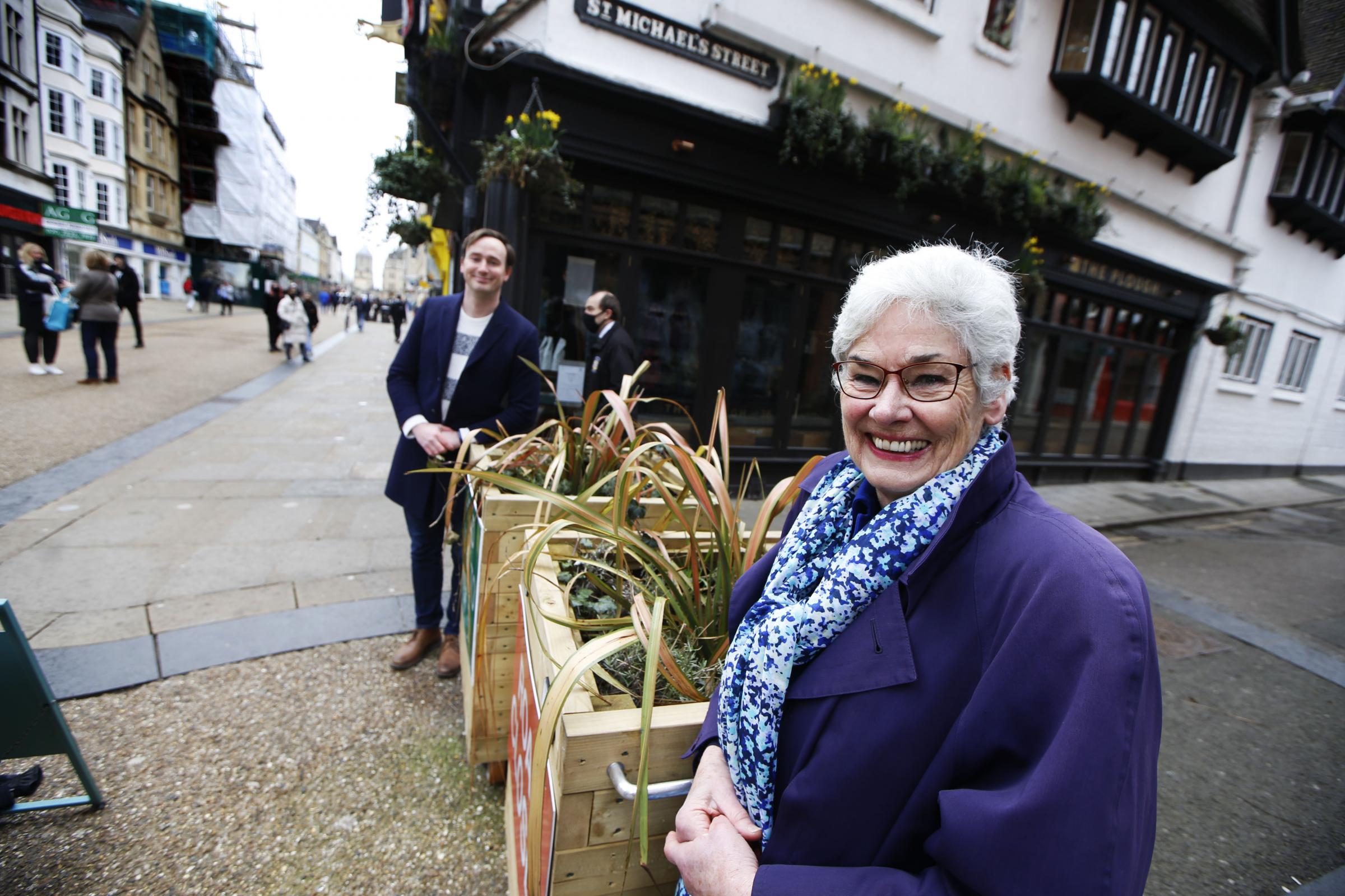 City streets will once again be pedestrianised for hospitality businesses to have outdoor seating from April. Tom Hayes of Oxford City Council, and Yvonne Constance of Oxfordshire County Council photographed on Cornmarket Street. Picture: Ed Nix