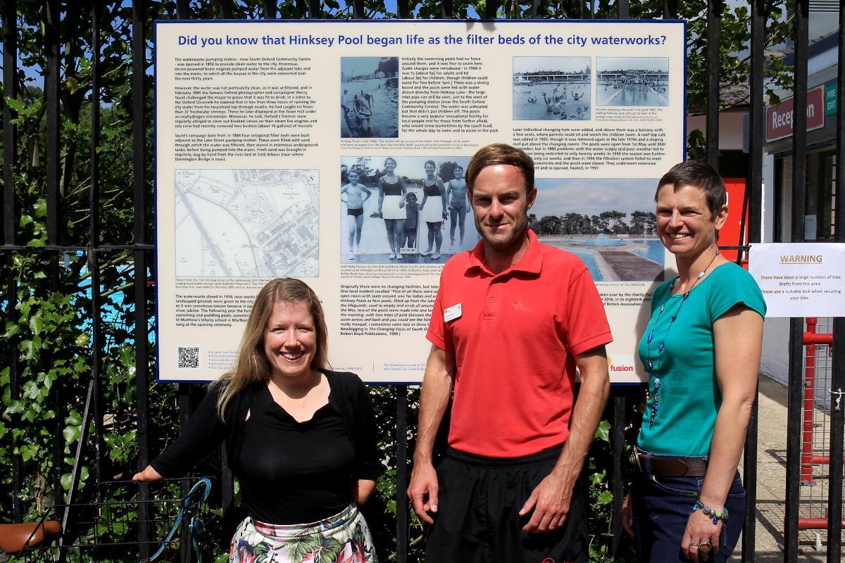 City councillor Marie Tidball, Fusions Laurie Parrick and historian Liz Woolley with an information board at Hinksey Pool in 2017