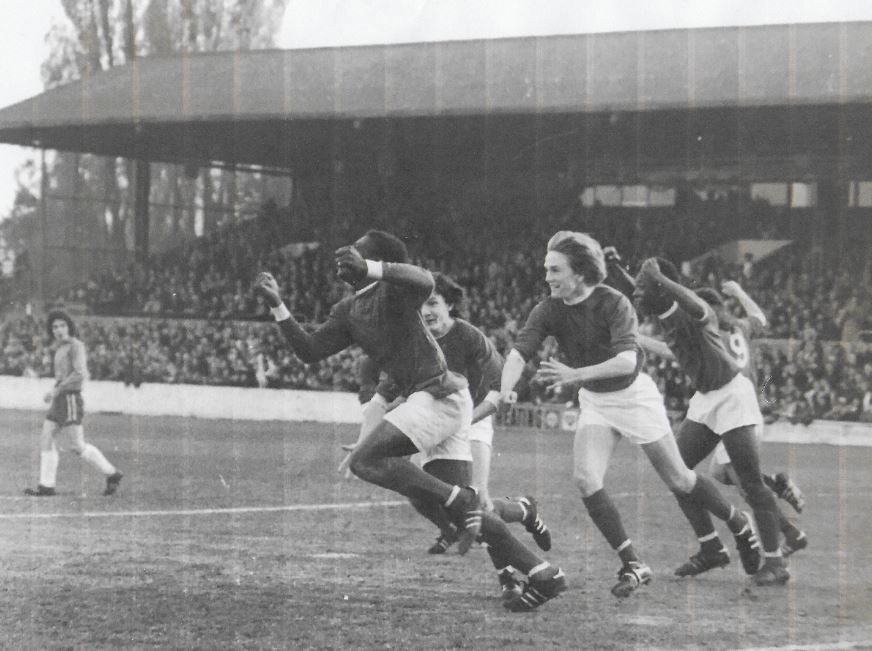 Chris Dawson leads team-mates in a dance of joy at the Manor Ground at Headington after scoring in the second leg of the 1974 final