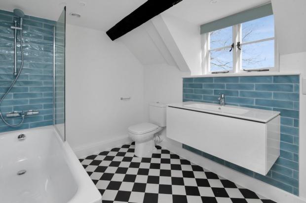 Oxford Mail: The property has two bathrooms. Picture: Strutt & Parker
