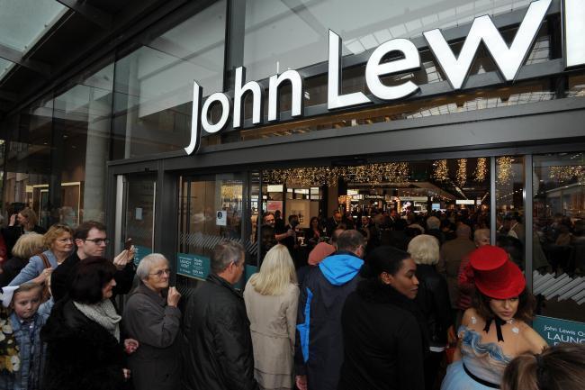 Shoppers scramble to get inside John Lewis on its opening day at Westgate in 2017