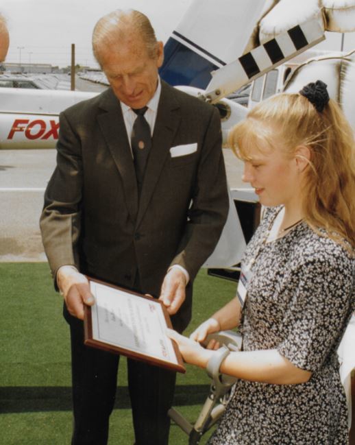 The Duke presents a Young Achiever of the Year award to Lisa Boyer, 15, of Burford School, in 1995