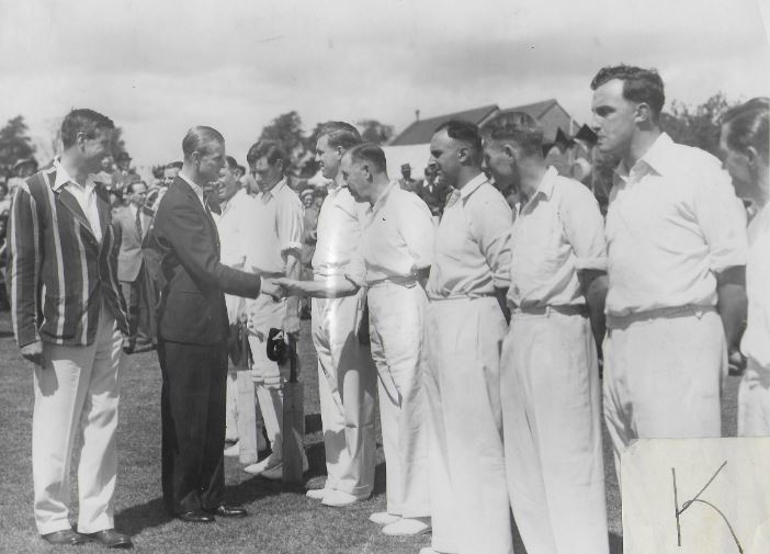 The Duke shakes hands with cricketers at Combe, near Woodstock, in 1949