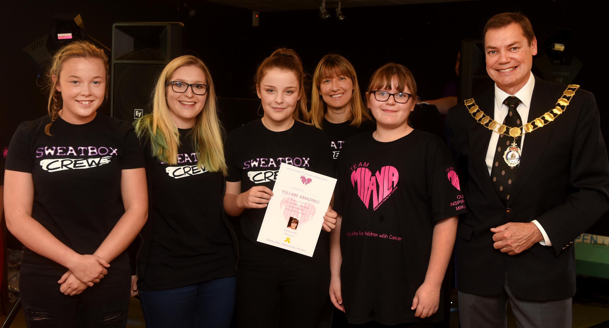 : Eleven-year-old Mikayla Beames, who has run a charity to help cancer sufferers like herself for the past three years, holding an awards ceremony at Wantage Comrades Club to celebrate and congratulate 60 of her top fundraisers and supporters..Sweatbox