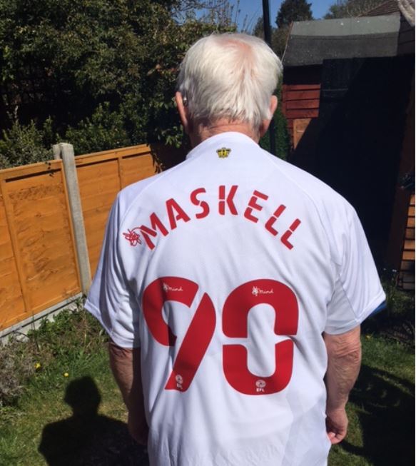 Danny Maskell shows off the back of his Watford shirt