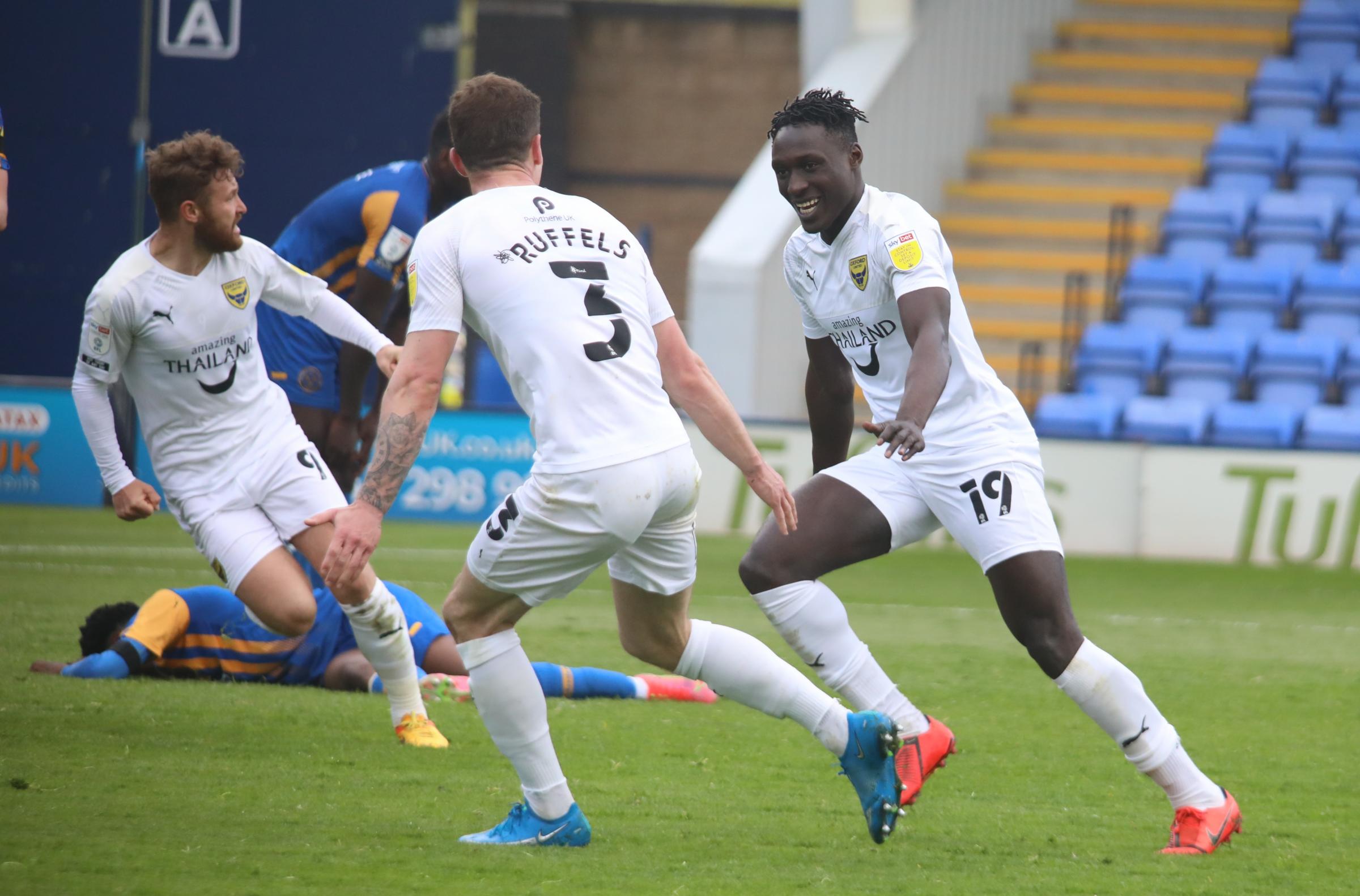 Dan Agyei celebrates with Josh Ruffels after scoring Oxford Uniteds late winner at Shrewsbury Town Picture: Darrell Fisher