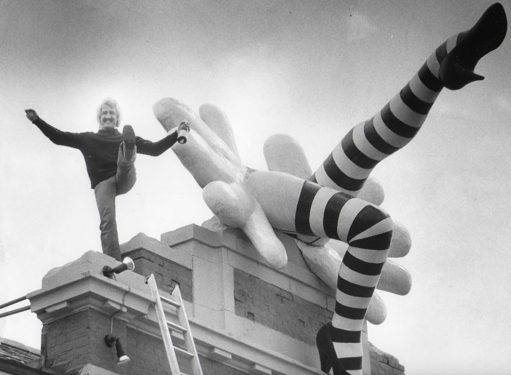 Bill Heine with the can-can legs on top of the Not the Moulin Rouge cinema in Headington