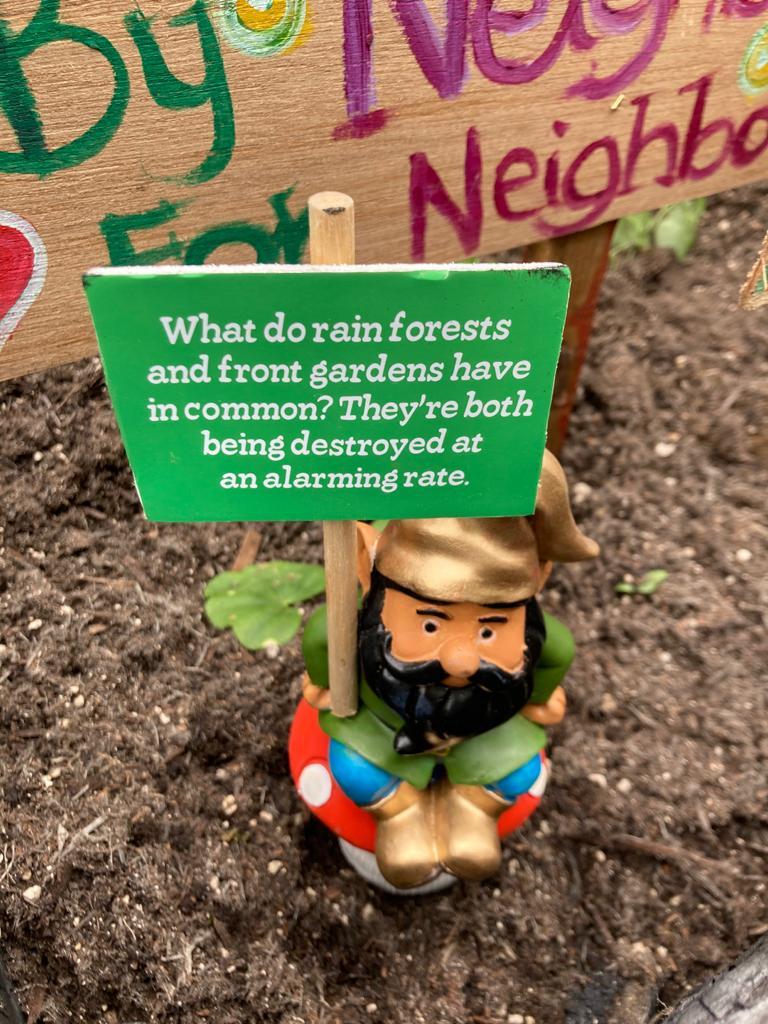 A gnome decorating the burned Rymers Lane LTN planter. Picture: Charlie Hicks