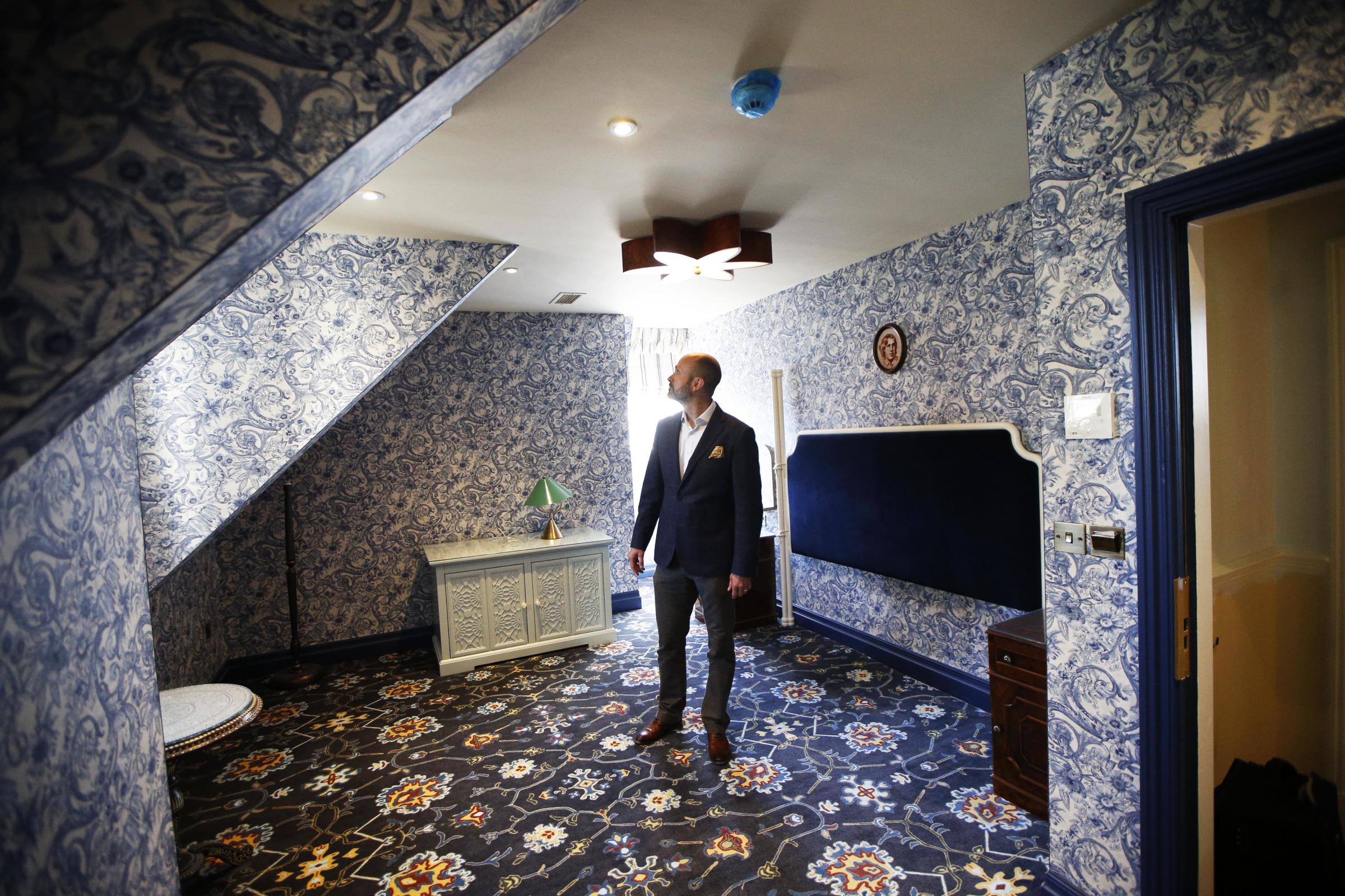 General manager Philip Lewis looks at the new bedroom design at the Randolph Hotel Picture: Ed Nix 