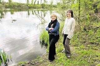 Oxford Preservation Trust director Debbie Dance, left, and Jo Malden, of the Wolvercote Commoners, by one of the lakes