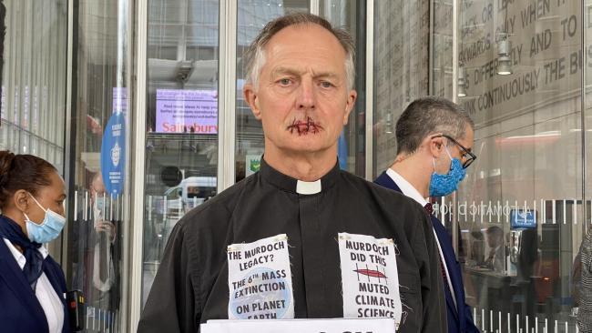 Tim Hewes Oxfordshire Vicar, sews lips shut in protest against Rupert Murdoch