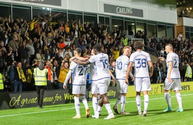 Oxford United celebrate with their fans after Nathan Holland's opener at Burton Albion Picture: Steve Edmunds