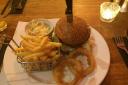 Top, lamb burger with chips and onion rings, with inset, chocolate brownie and ice cream 