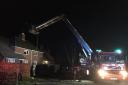 Crews tackle village chimney fire