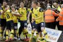 Oxford United players celebrate during the FA Cup tie against Newcastle United, at the Kassam Stadium. Picture: David Fleming