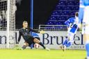 Simon Eastwood makes a save during Oxford United's Emirates FA Cup defeat at Bristol Rovers Picture: Steve Edmunds