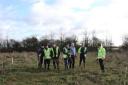 Volunteers plant 1,000 trees at new community woodland near Bicester.