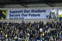 OxVox revealed a banner in support of the Oxford United stadium project prior to the Emirates FA Cup clash against Arsenal. Pictures: David Fleming