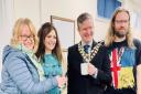 Bicester Mayor Alex Thrupp (centre right), Amanda Claire Lewin (centre left) and volunteers at the Ukrainian Clothes Centre in Bicester