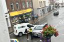 Police close town high street due to crash