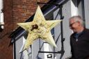 The new sign outside the Star pub shows a star with a bottle of beer in the eye inspired by the 1902 film ‘A Trip to the Moon’