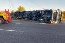 Two lanes closed and major delays after lorry overturns on M40