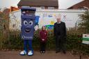 Ava Smith and Mollie Malcher from Christopher Rawlins School are pictured with council recycling mascot Binbo.